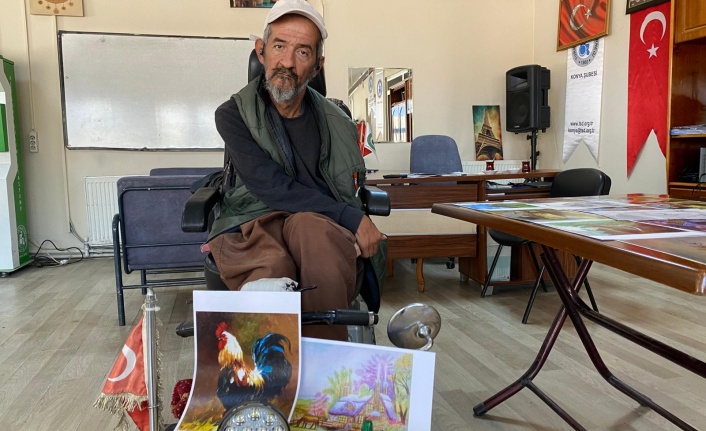 Sol ayağıyla hayallerini çizen ressam herkese ilham veriyor